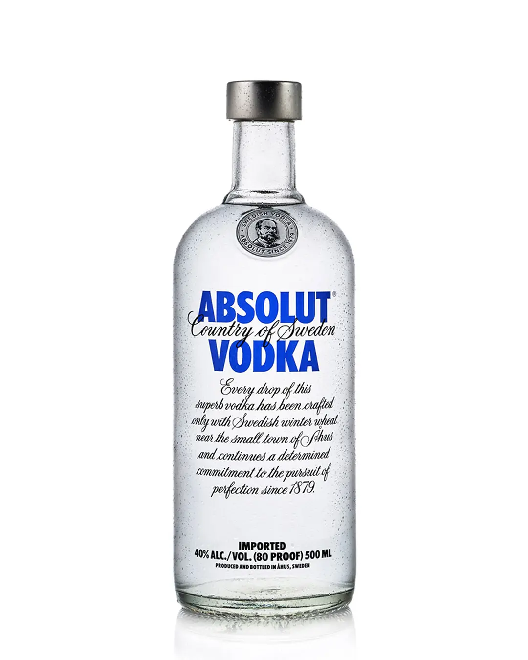 Absolut Vodka bottle with clear glass, bold blue text, and condensation droplets, standing against a white background.